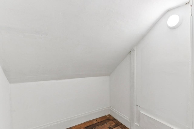 1617 69th St, Kenosha, WI 53143 - bonus room with vaulted ceiling and dark wood-style flooring