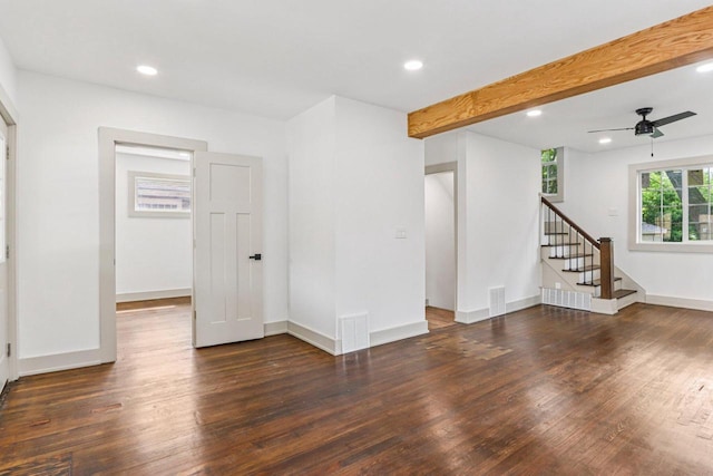 1617 69th St, Kenosha, WI 53143 - unfurnished living room with wood finished floors, recessed lighting, ceiling fan, beamed ceiling, and stairs