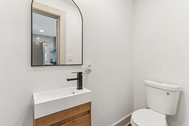 1617 69th St, Kenosha, WI 53143 - half bathroom with vanity and toilet