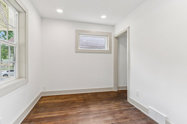 1617 69th St, Kenosha, WI 53143 - spare room with wood finished floors and recessed lighting