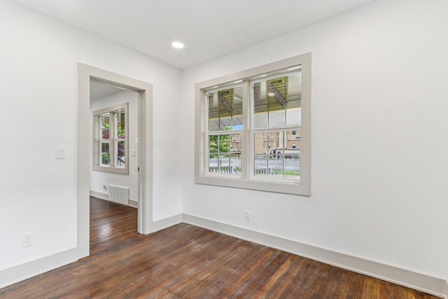 1617 69th St, Kenosha, WI 53143 - spare room with healthy amount of natural light, dark wood finished floors, and recessed lighting