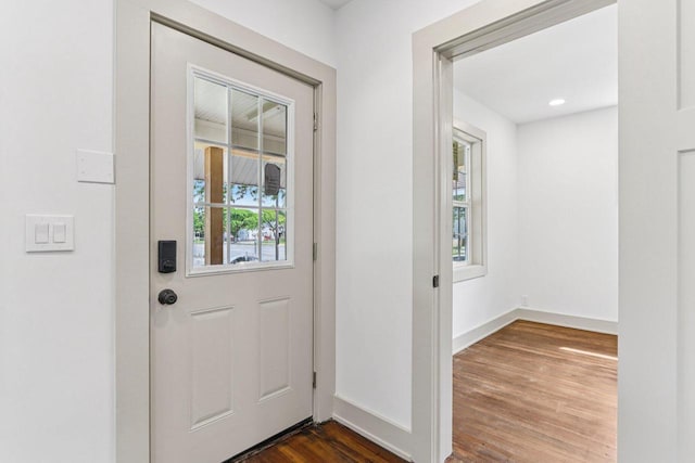 1617 69th St, Kenosha, WI 53143 - doorway with dark wood finished floors and baseboards