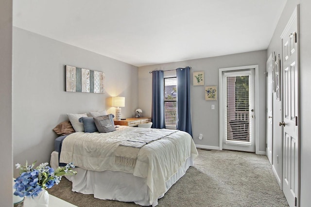 408 55th St Unit B, Kenosha, WI 53140 - bedroom with access to outside and carpet flooring