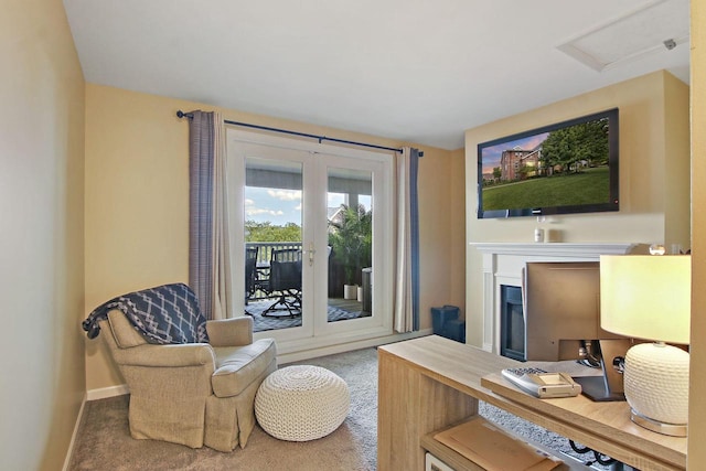 408 55th St Unit B, Kenosha, WI 53140 - living room with carpet flooring, a fireplace, and attic access