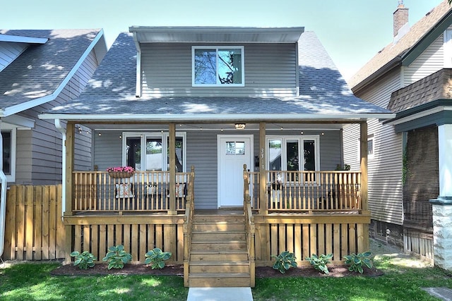 3313 S Delaware Ave, Milwaukee, WI 53207 - view of front of home featuring covered porch, a shingled roof, and french doors