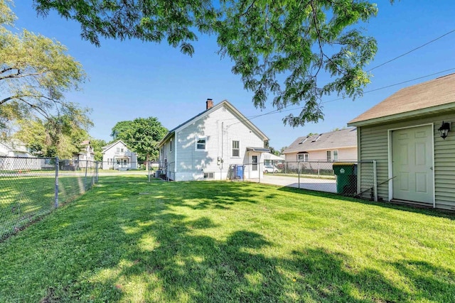 517 12th Ave, Green Bay, WI 54303 - rear view of property featuring a fenced backyard and a chimney