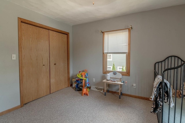 1915 7th St, Monroe, WI 53566 - carpeted bedroom featuring a closet and baseboards