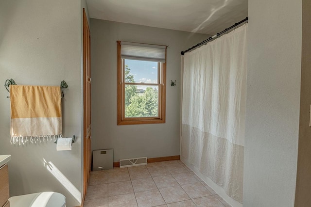1915 7th St, Monroe, WI 53566 - bathroom with tile patterned flooring, vanity, and curtained shower