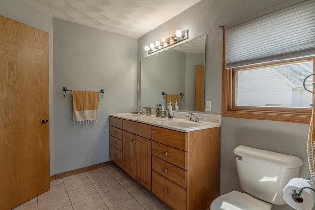 1915 7th St, Monroe, WI 53566 - bathroom featuring double vanity and tile patterned floors