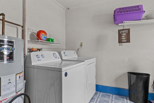 624 W 8th Ave, Oshkosh, WI 54902 - laundry area featuring water heater and washer and dryer