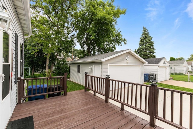624 W 8th Ave, Oshkosh, WI 54902 - wooden deck with a detached garage and an outbuilding