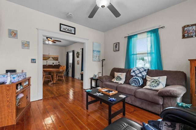 624 W 8th Ave, Oshkosh, WI 54902 - living room featuring a ceiling fan and hardwood / wood-style flooring