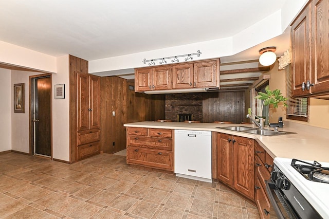 7701 W Coventry Dr, Franklin, WI 53132 - kitchen with white dishwasher, gas stove, brown cabinetry, and light countertops
