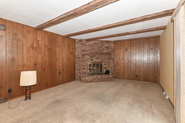 7701 W Coventry Dr, Franklin, WI 53132 - unfurnished living room featuring wooden walls, beamed ceiling, carpet, and a fireplace