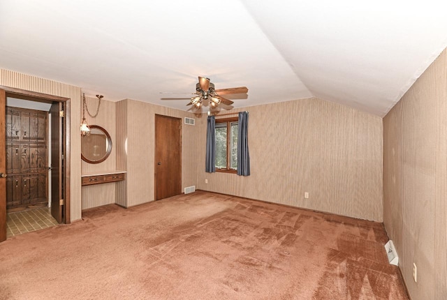 7701 W Coventry Dr, Franklin, WI 53132 - unfurnished bedroom with carpet flooring, wallpapered walls, vaulted ceiling, a closet, and connected bathroom