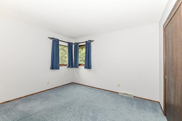 7701 W Coventry Dr, Franklin, WI 53132 - carpeted spare room featuring baseboards