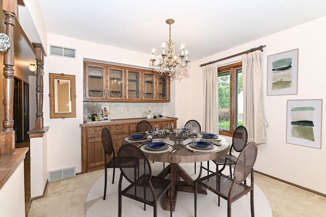 7701 W Coventry Dr, Franklin, WI 53132 - dining room featuring light carpet and a chandelier