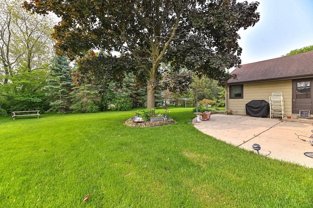 7701 W Coventry Dr, Franklin, WI 53132 - view of green lawn with a patio