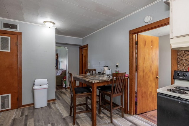 722 Avon St, La Crosse, WI 54603 - dining space featuring ornamental molding and wood finished floors