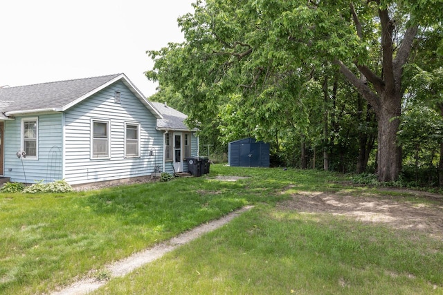 722 Avon St, La Crosse, WI 54603 - view of green lawn featuring a shed