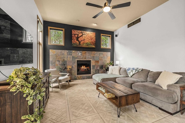 1022 Cortland Ln, Stevens Point, WI 54482 - living room with ceiling fan and a fireplace