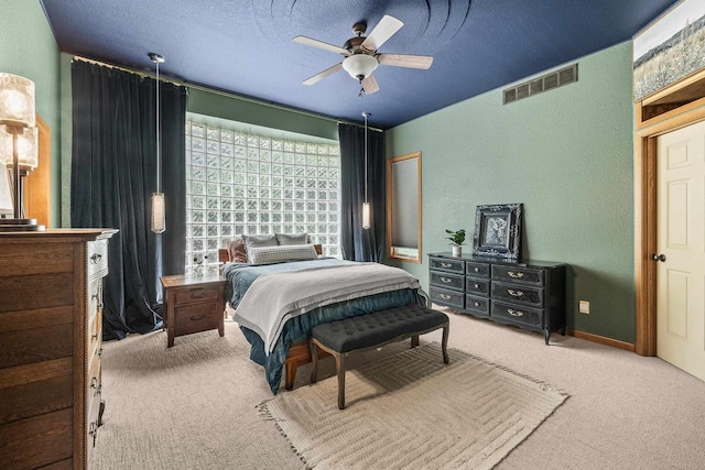 1022 Cortland Ln, Stevens Point, WI 54482 - carpeted bedroom featuring a textured wall, a textured ceiling, and ceiling fan