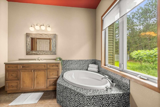 1022 Cortland Ln, Stevens Point, WI 54482 - bathroom featuring vanity, a bath, and tile patterned flooring