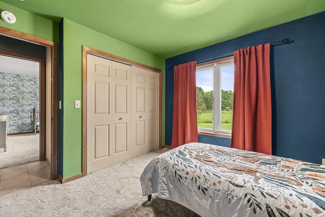 1022 Cortland Ln, Stevens Point, WI 54482 - carpeted bedroom with a closet and baseboards