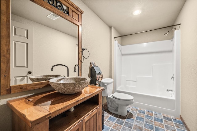 1022 Cortland Ln, Stevens Point, WI 54482 - bathroom with vanity, shower / tub combination, and a textured wall