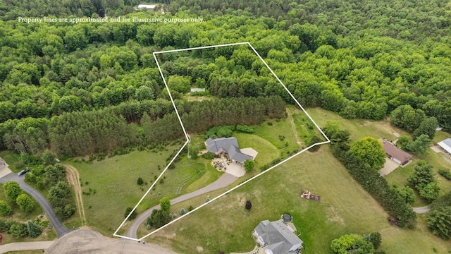 1022 Cortland Ln, Stevens Point, WI 54482 - aerial overview of property's location featuring a heavily wooded area and property parcel outlined