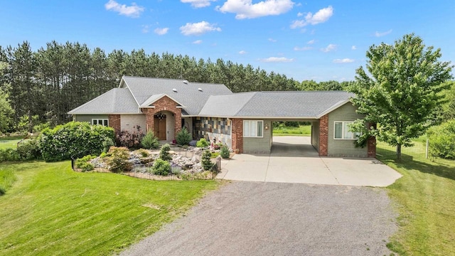 1022 Cortland Ln, Stevens Point, WI 54482 - ranch-style home featuring driveway, a front lawn, brick siding, and an attached carport