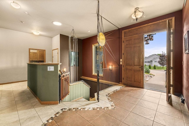 1022 Cortland Ln, Stevens Point, WI 54482 - foyer entrance with light tile patterned floors and recessed lighting