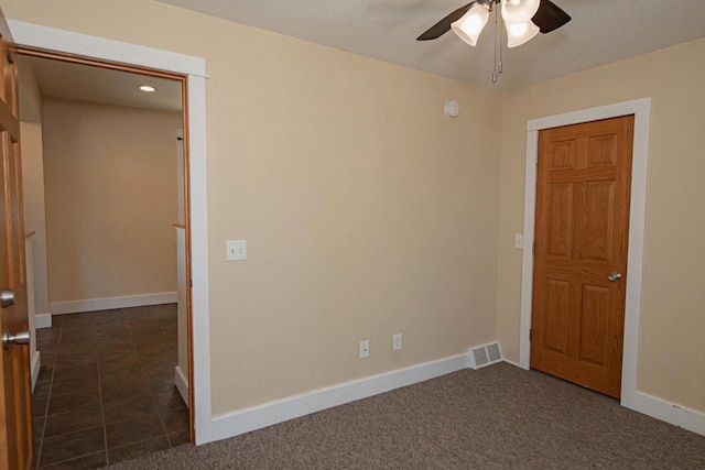 604 Wilson St, Winona, MN 55987 - unfurnished room featuring a ceiling fan, recessed lighting, and dark colored carpet