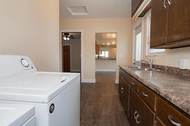 604 Wilson St, Winona, MN 55987 - laundry area with cabinet space, washing machine and clothes dryer, dark wood-style floors, and ceiling fan