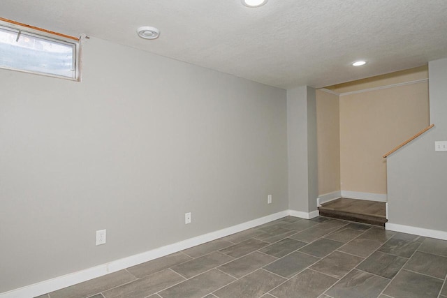 604 Wilson St, Winona, MN 55987 - below grade area with recessed lighting and a textured ceiling