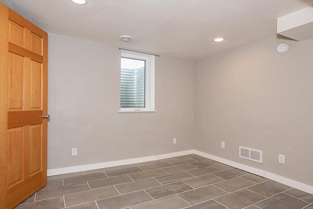 604 Wilson St, Winona, MN 55987 - empty room featuring recessed lighting and a smoke detector