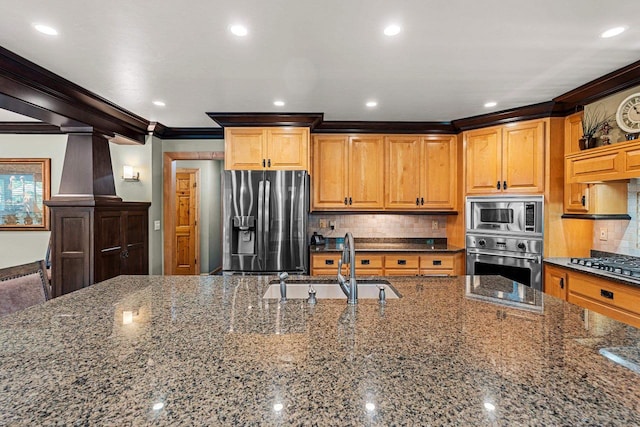 260 S Clay St, De Pere, WI 54115 - kitchen featuring appliances with stainless steel finishes, crown molding, dark stone countertops, backsplash, and recessed lighting