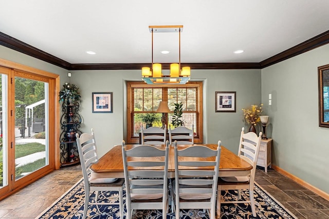 260 S Clay St, De Pere, WI 54115 - dining area featuring stone tile flooring, crown molding, a chandelier, healthy amount of natural light, and recessed lighting
