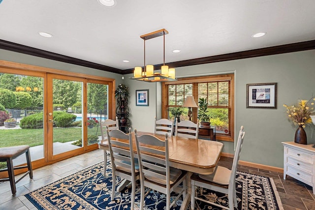 260 S Clay St, De Pere, WI 54115 - dining room featuring crown molding, healthy amount of natural light, stone tile flooring, a chandelier, and recessed lighting
