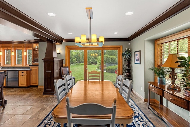 260 S Clay St, De Pere, WI 54115 - dining area with ornamental molding, healthy amount of natural light, a chandelier, stone tile floors, and recessed lighting