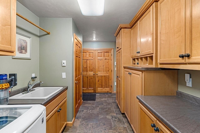 260 S Clay St, De Pere, WI 54115 - laundry area with stone finish floors and cabinet space