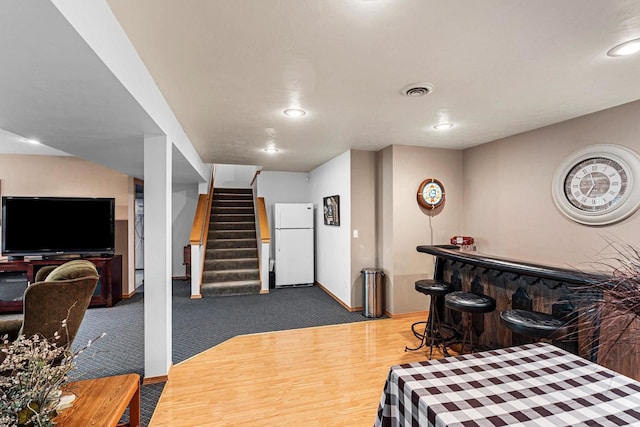 260 S Clay St, De Pere, WI 54115 - dining area featuring a bar, stairs, and recessed lighting