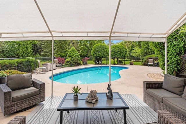 260 S Clay St, De Pere, WI 54115 - view of swimming pool featuring an outdoor living space, a patio area, a fenced backyard, and view of wooded area