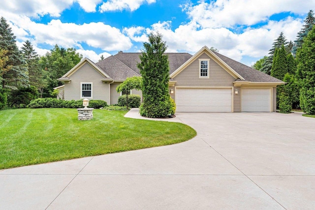 260 S Clay St, De Pere, WI 54115 - view of front of home featuring concrete driveway, a front lawn, and a garage