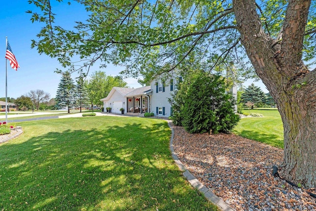 4814 Placid Way, New Franken, WI 54229 - view of property exterior with an attached garage, a lawn, and driveway
