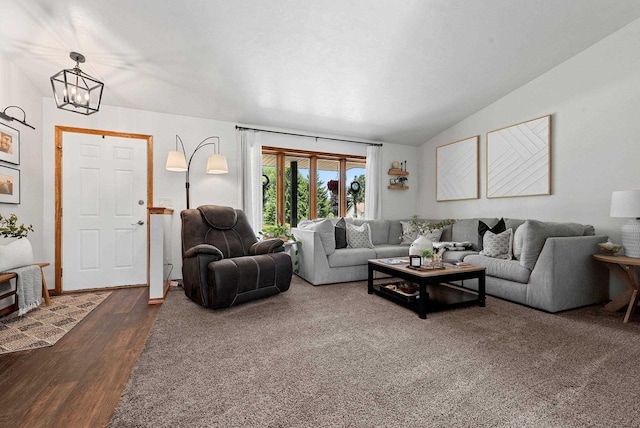 4814 Placid Way, New Franken, WI 54229 - living area with a chandelier, dark wood-style floors, and vaulted ceiling