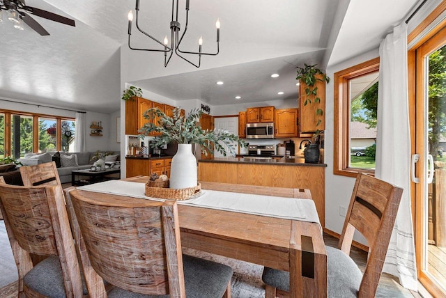 4814 Placid Way, New Franken, WI 54229 - dining area with lofted ceiling, recessed lighting, a ceiling fan, and a chandelier