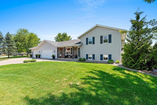 4814 Placid Way, New Franken, WI 54229 - tri-level home with covered porch, driveway, a front yard, and a garage