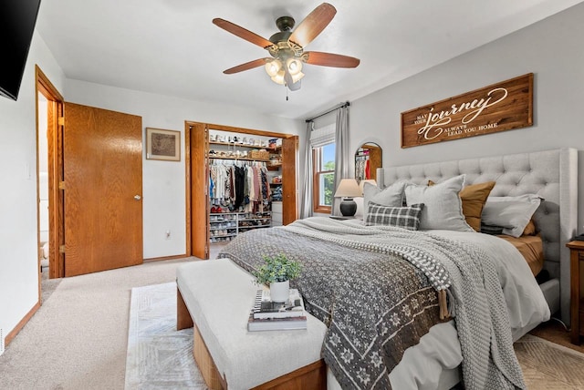 4814 Placid Way, New Franken, WI 54229 - bedroom featuring light carpet, a closet, and a ceiling fan