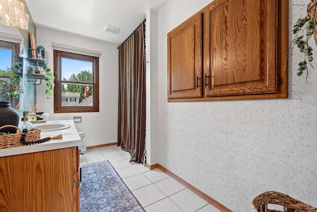 4814 Placid Way, New Franken, WI 54229 - full bath with double vanity, tile patterned floors, and wallpapered walls